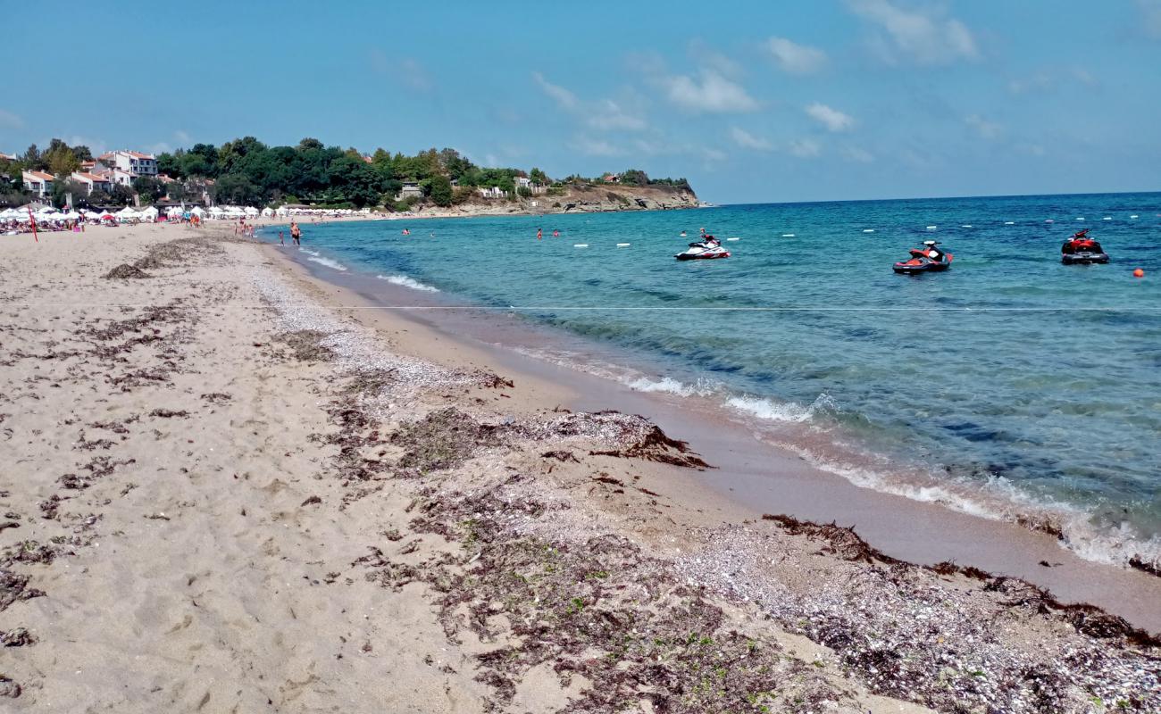 Oasis beach'in fotoğrafı parlak ince kum yüzey ile