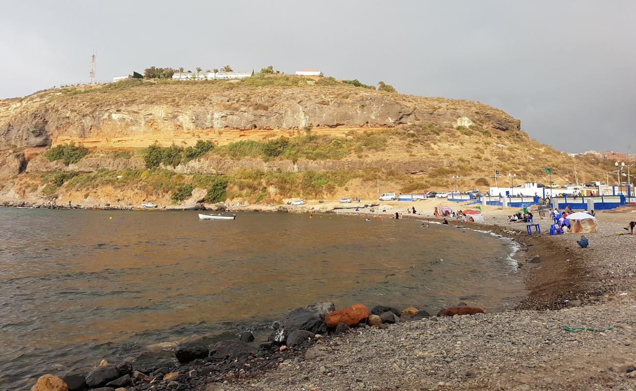 Plage Oued Abdellah'in fotoğrafı bej kum ve kayalar yüzey ile