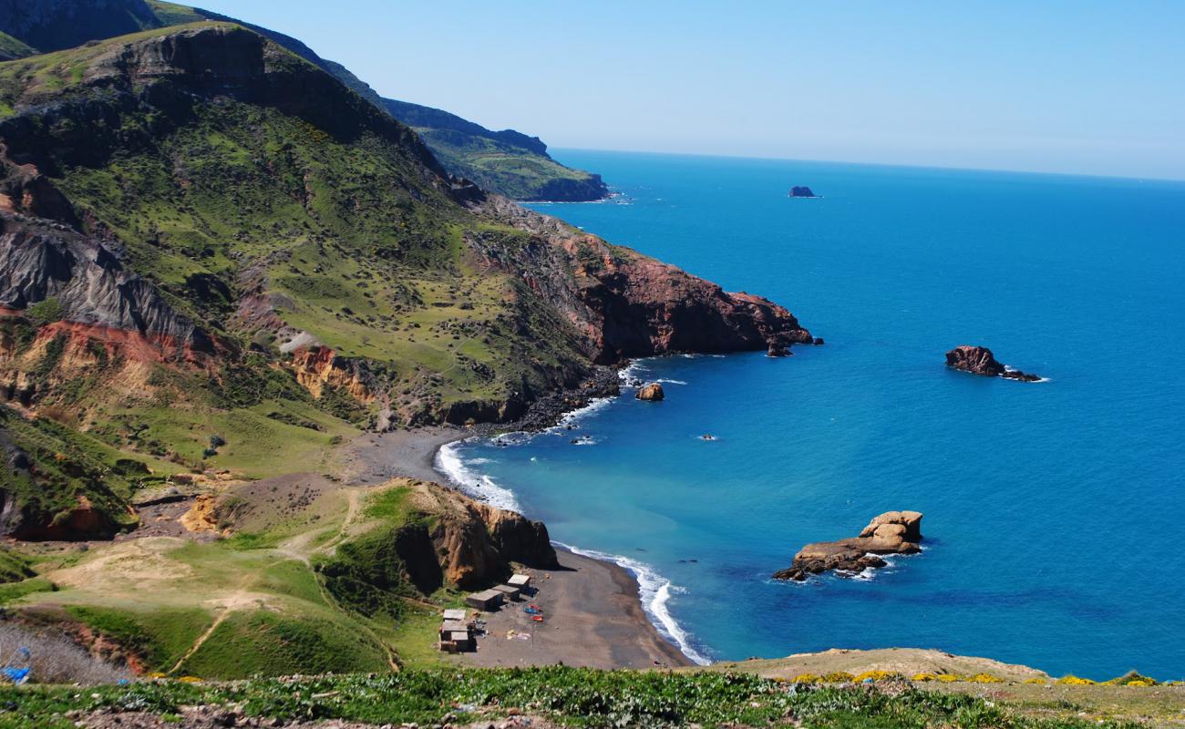 Plage de Zouanif'in fotoğrafı taşlı kum yüzey ile