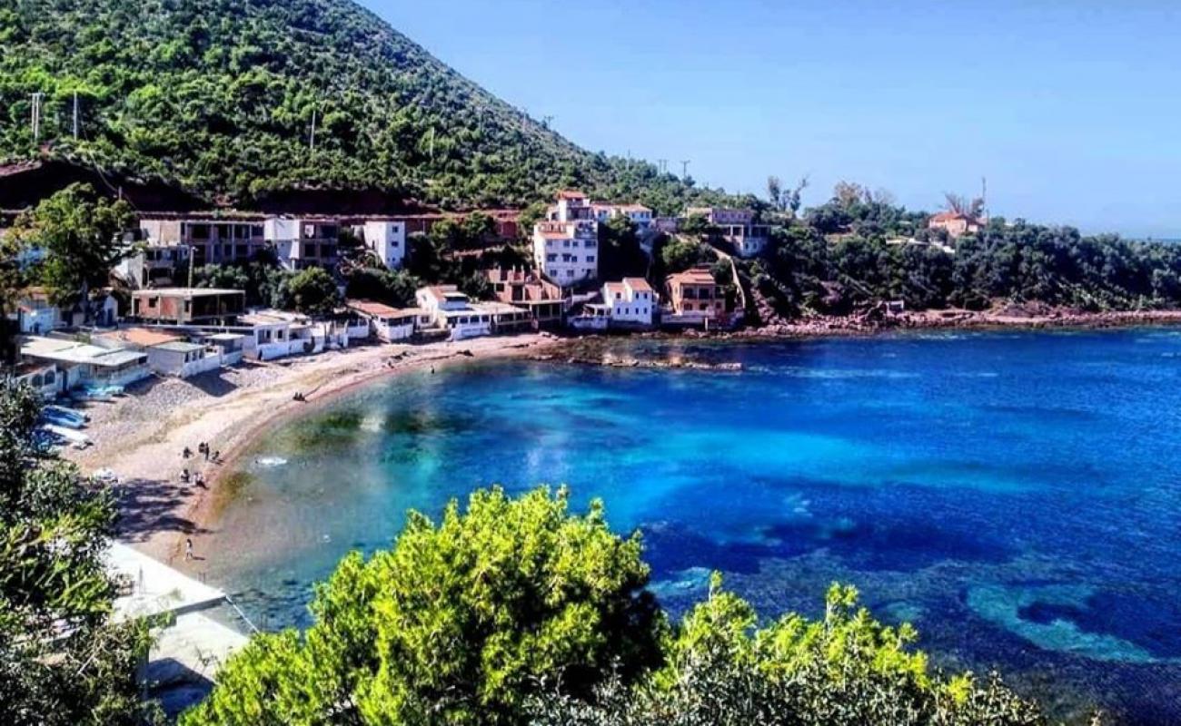 Carroubier beach'in fotoğrafı taşlar yüzey ile