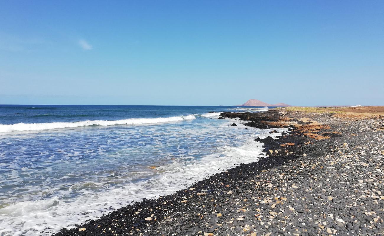 Black Beach'in fotoğrafı taşlı kum yüzey ile