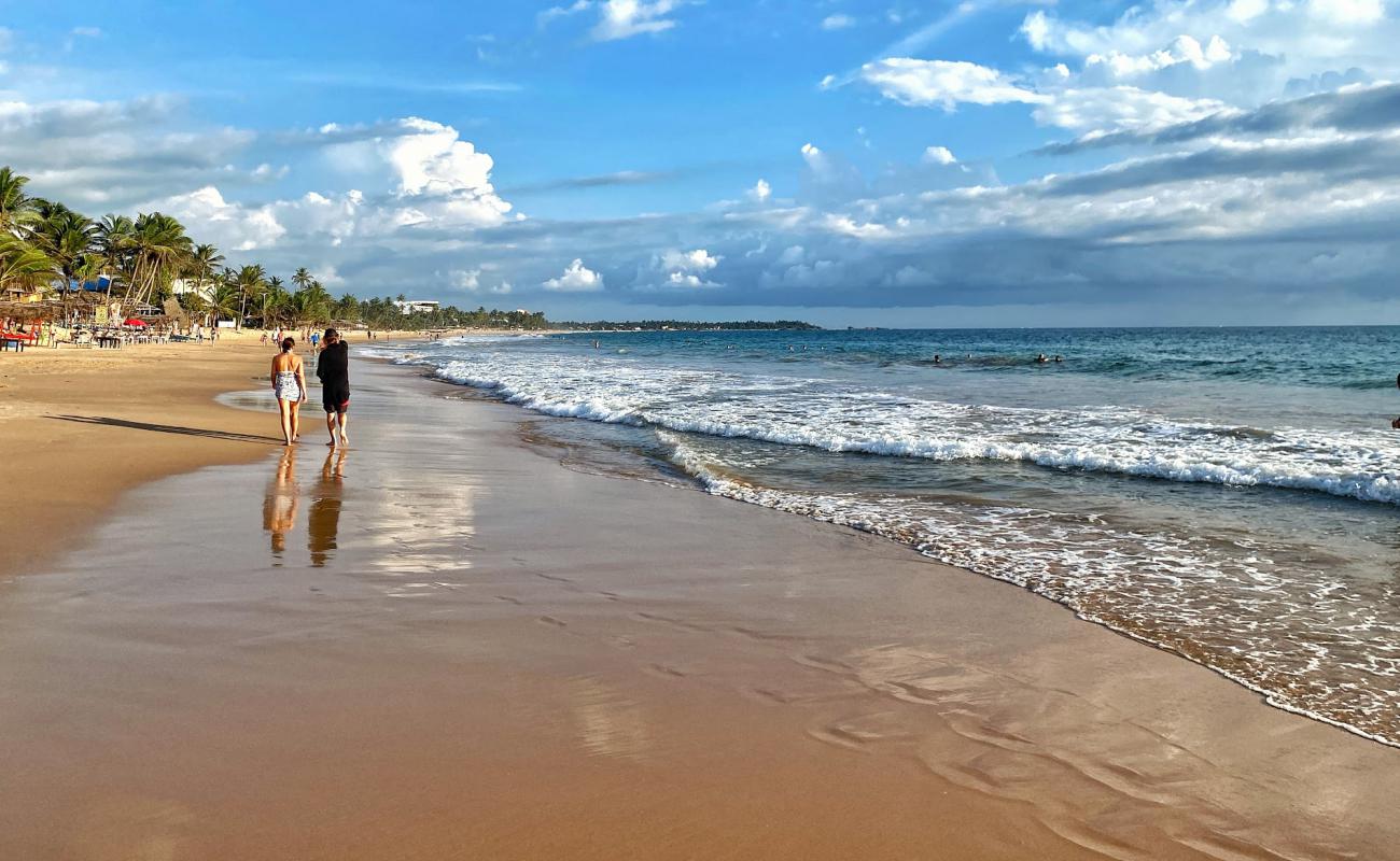 Narigama Beach'in fotoğrafı açık bej kum yüzey ile