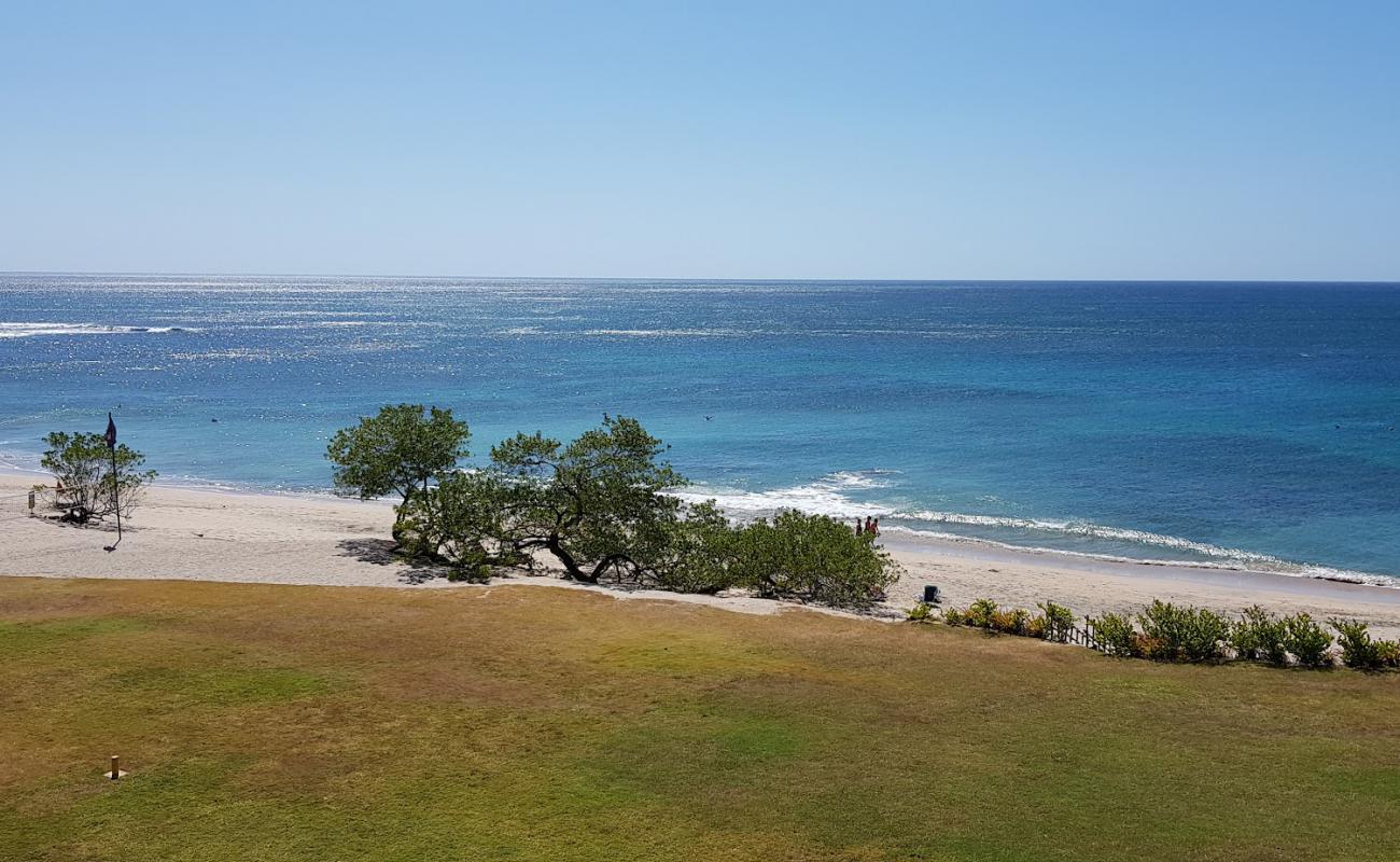 Mansita Beach'in fotoğrafı parlak kum ve kayalar yüzey ile