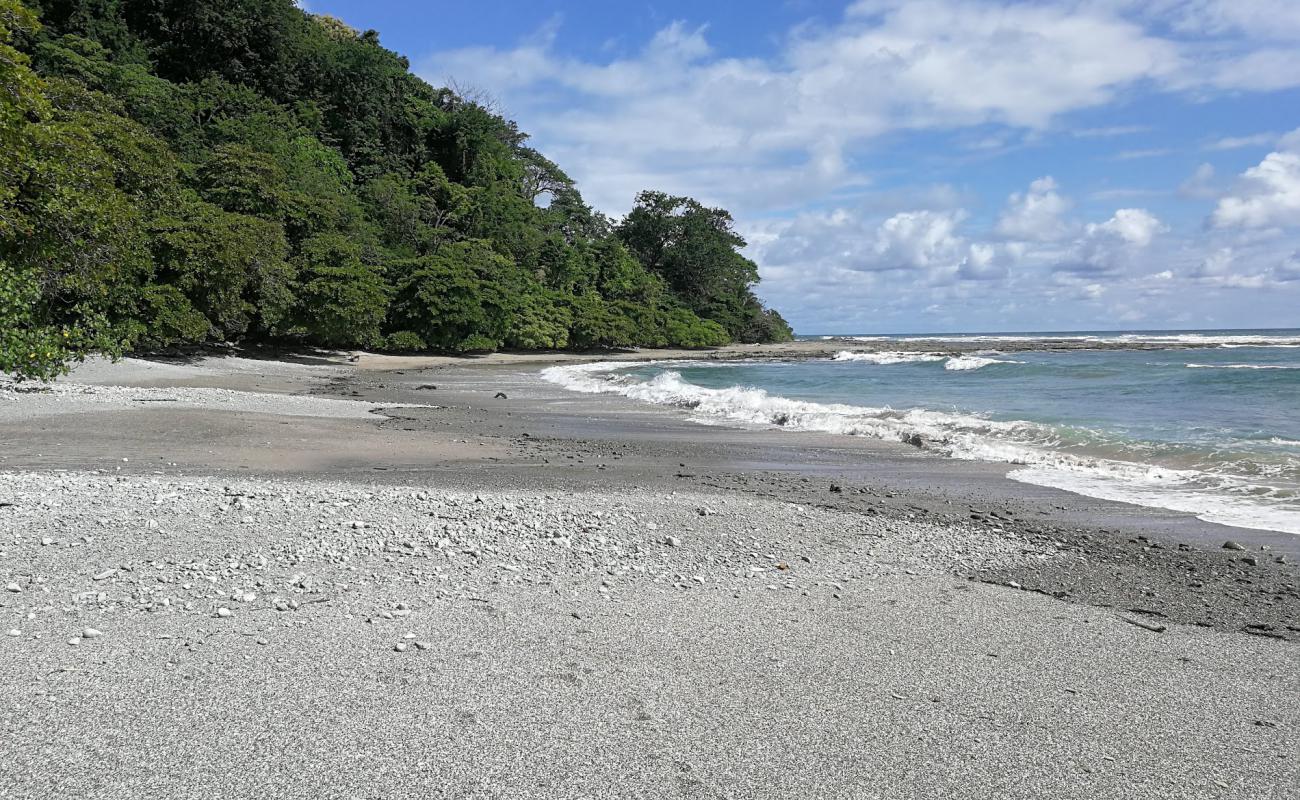 Playa Divina'in fotoğrafı bej kum ve kayalar yüzey ile
