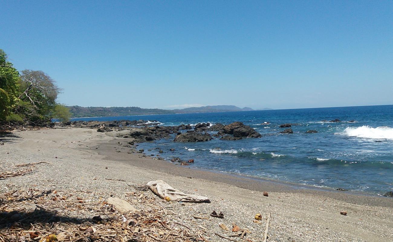 Playa Los Cedros'in fotoğrafı bej kum ve kayalar yüzey ile