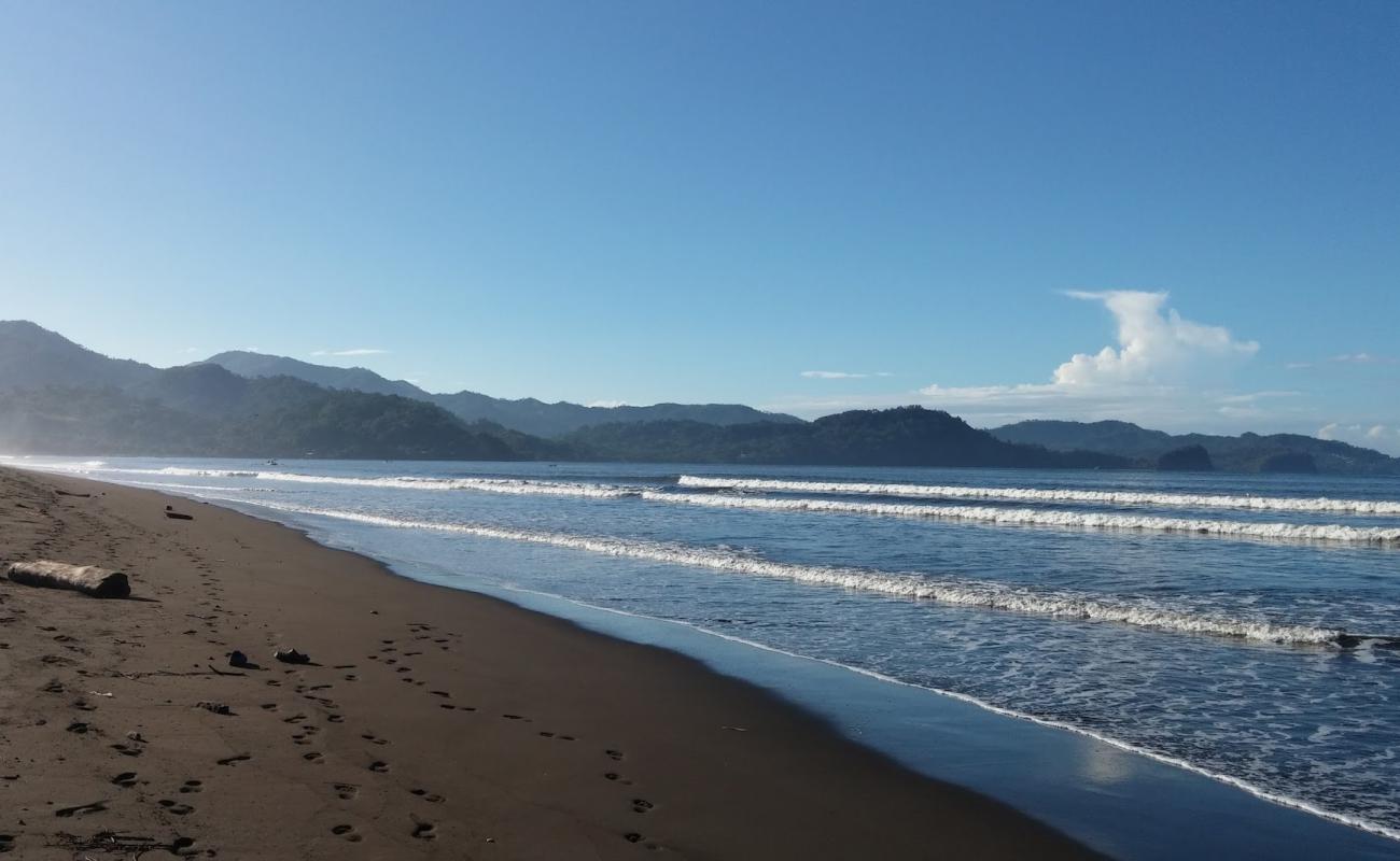 Playa Tarcoles'in fotoğrafı kahverengi kum yüzey ile