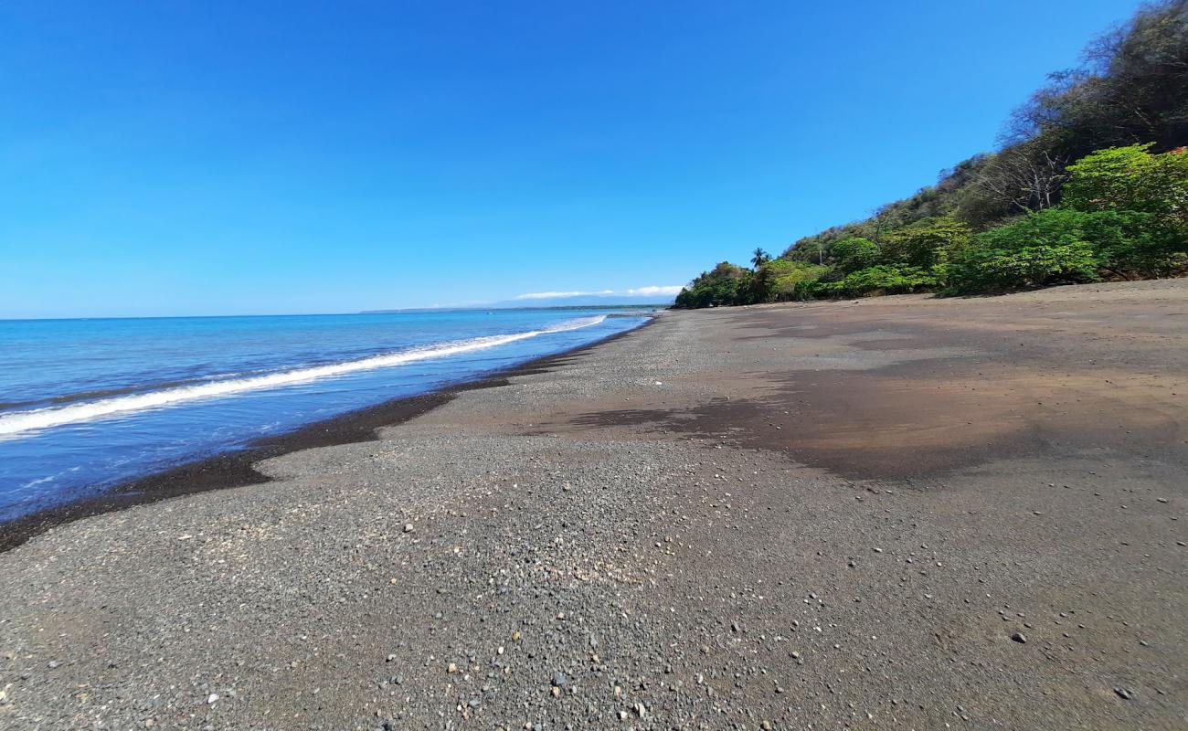 Playa Pogeres'in fotoğrafı kahverengi kum yüzey ile