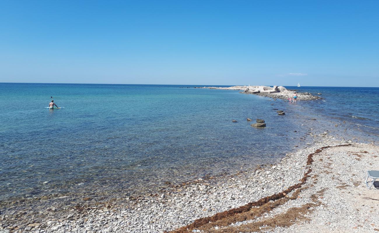 Polynesia beach'in fotoğrafı taşlar yüzey ile