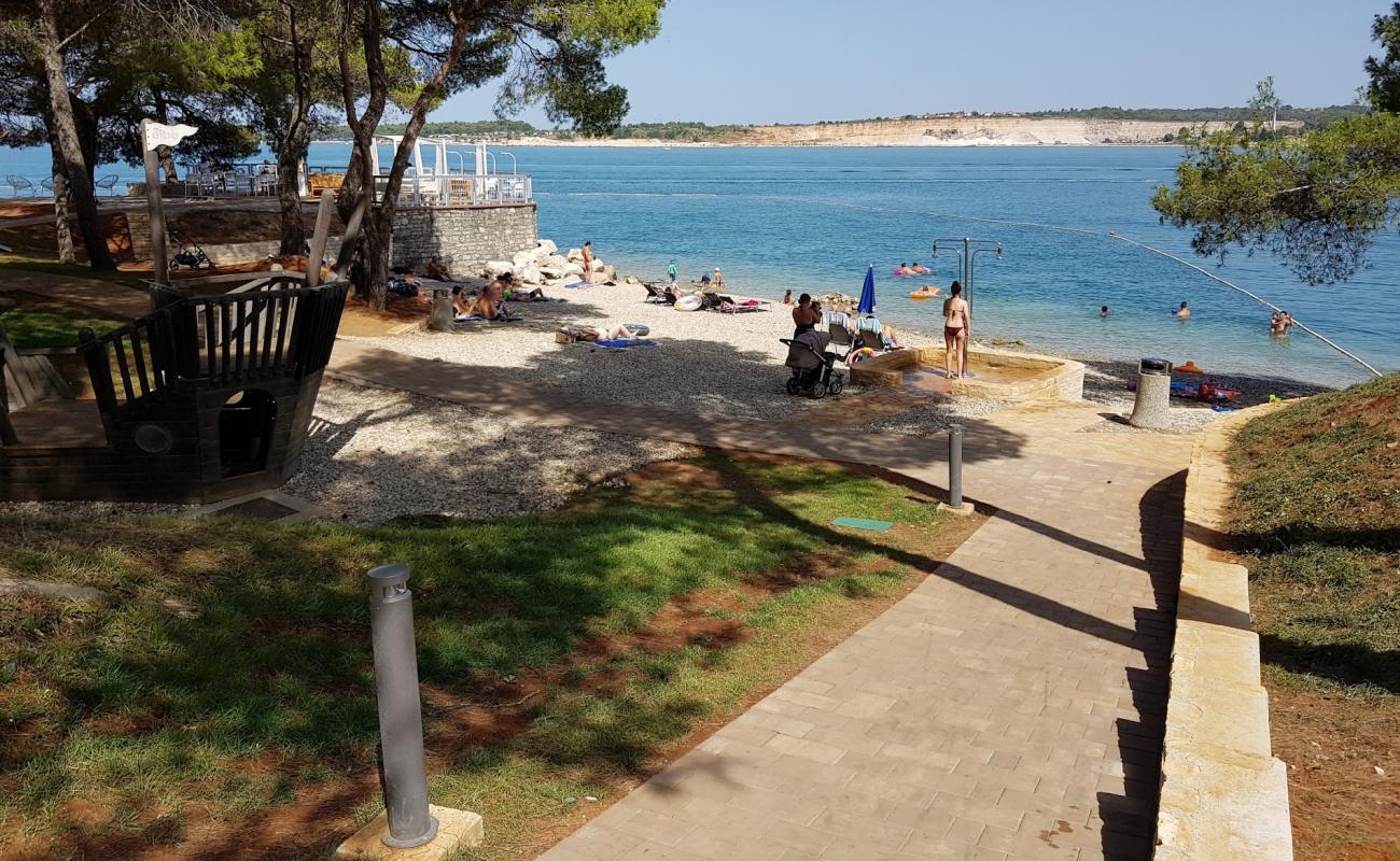 Lanterna beach'in fotoğrafı küçük bej çakıl yüzey ile