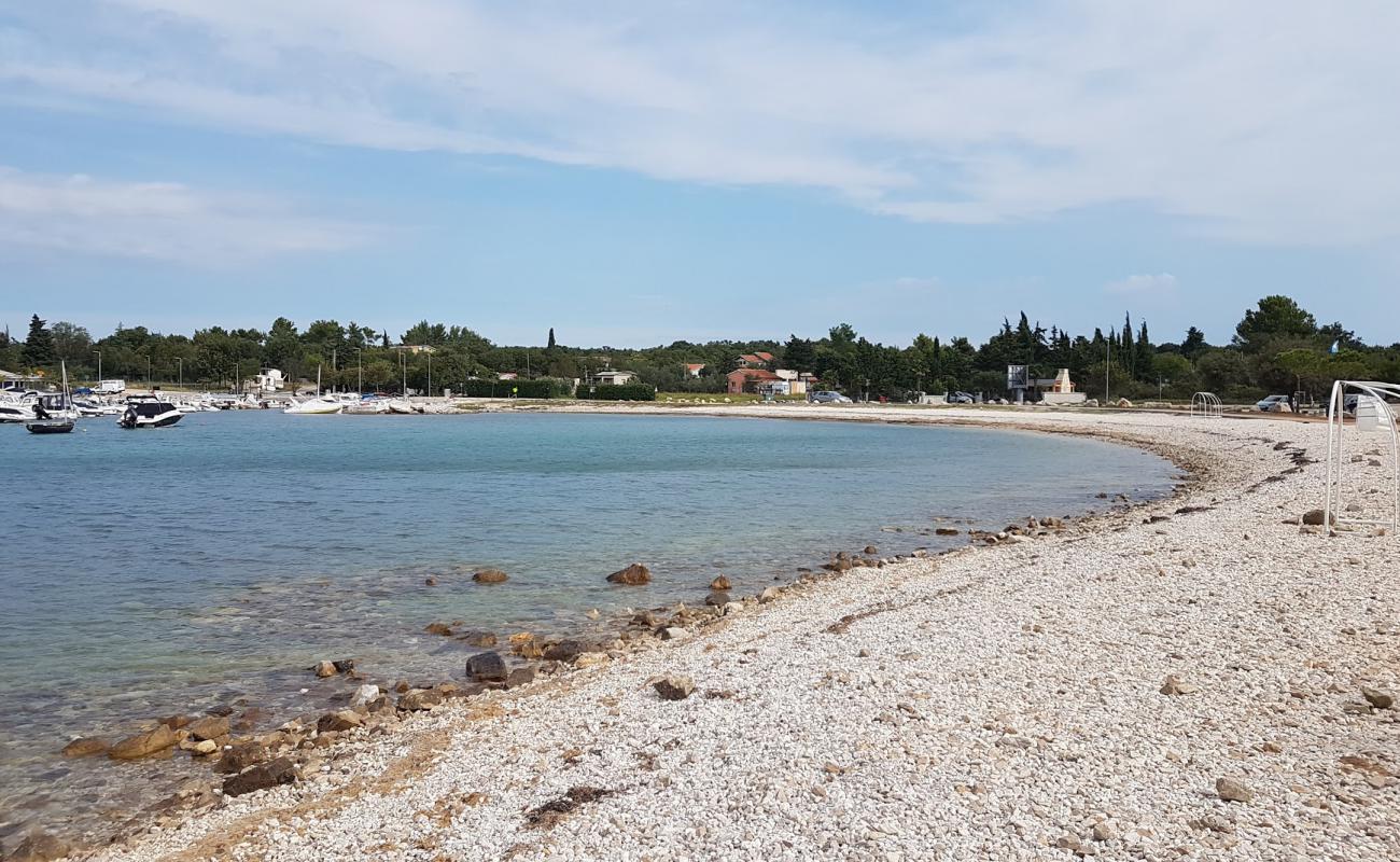 Portic beach'in fotoğrafı taşlar yüzey ile