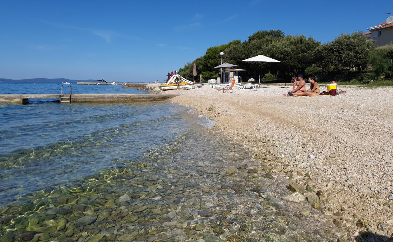 Donje Petrcane beach'in fotoğrafı bej kum ve kayalar yüzey ile
