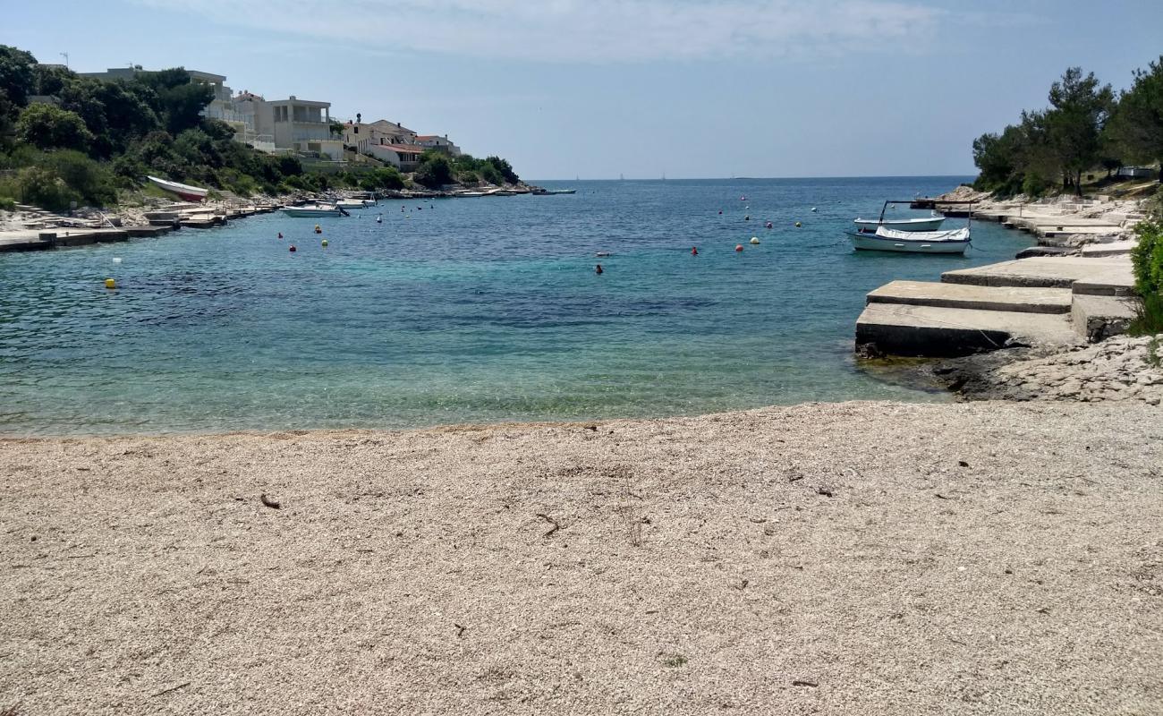 Kanica beach'in fotoğrafı küçük bej çakıl yüzey ile