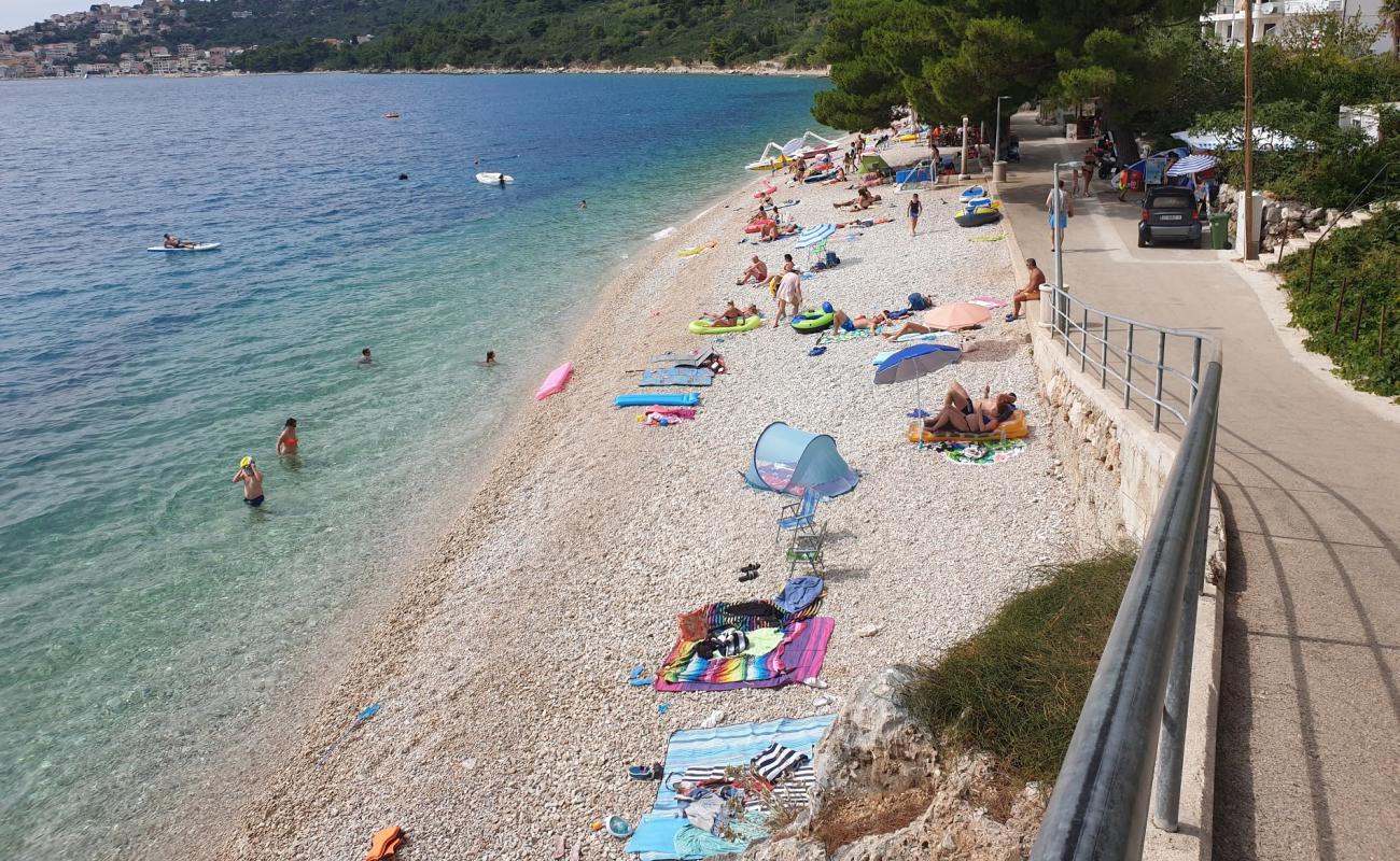 Porat beach'in fotoğrafı hafif çakıl yüzey ile