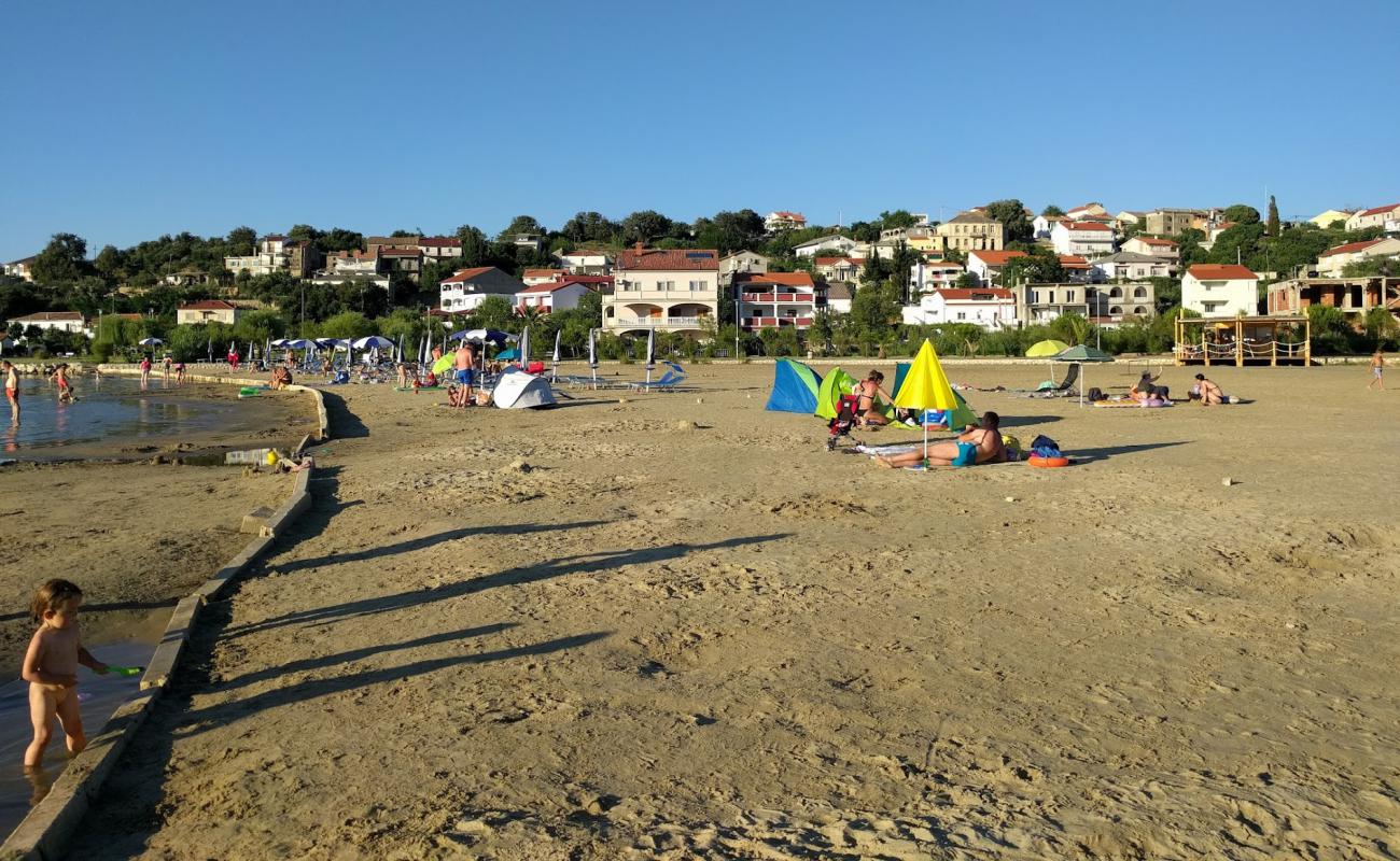 Lopar beach'in fotoğrafı parlak ince kum yüzey ile