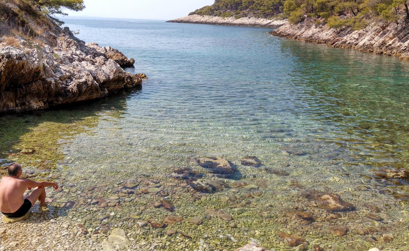 Paradiso beach'in fotoğrafı hafif çakıl yüzey ile