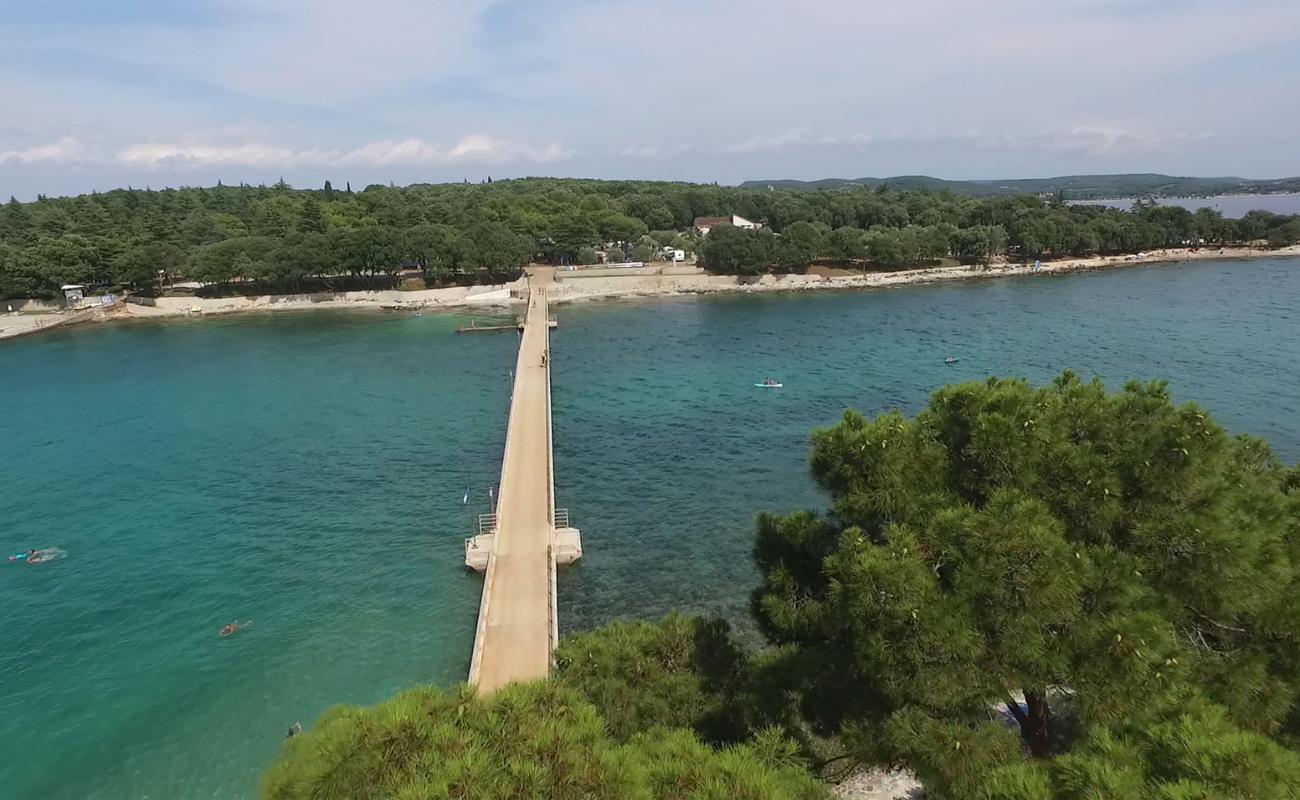 Koversada Naturist Beach'in fotoğrafı taşlar yüzey ile