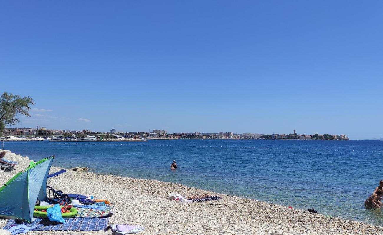 Puntamika Beach'in fotoğrafı gri çakıl taşı yüzey ile