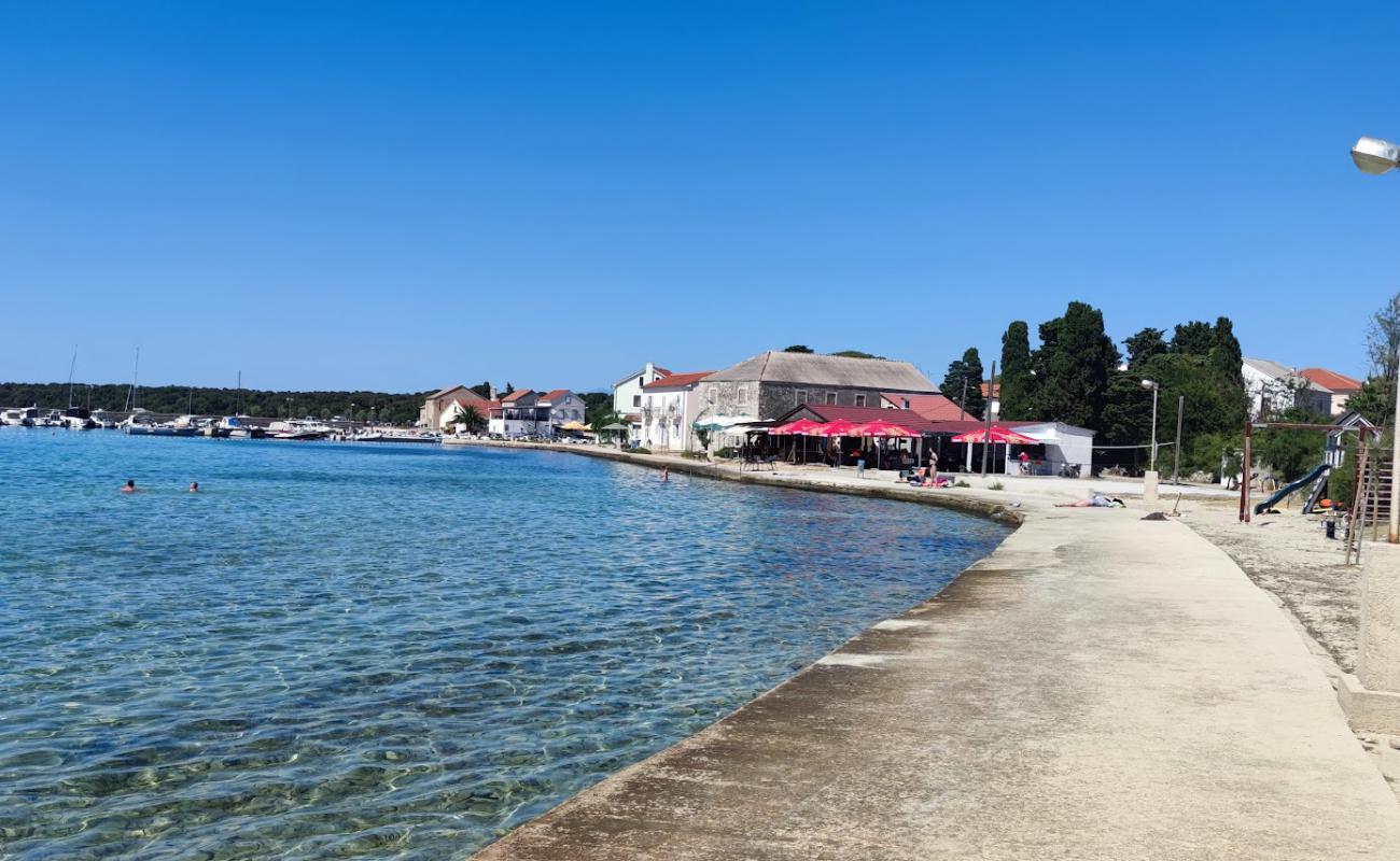 Olib Beach'in fotoğrafı taşlar yüzey ile