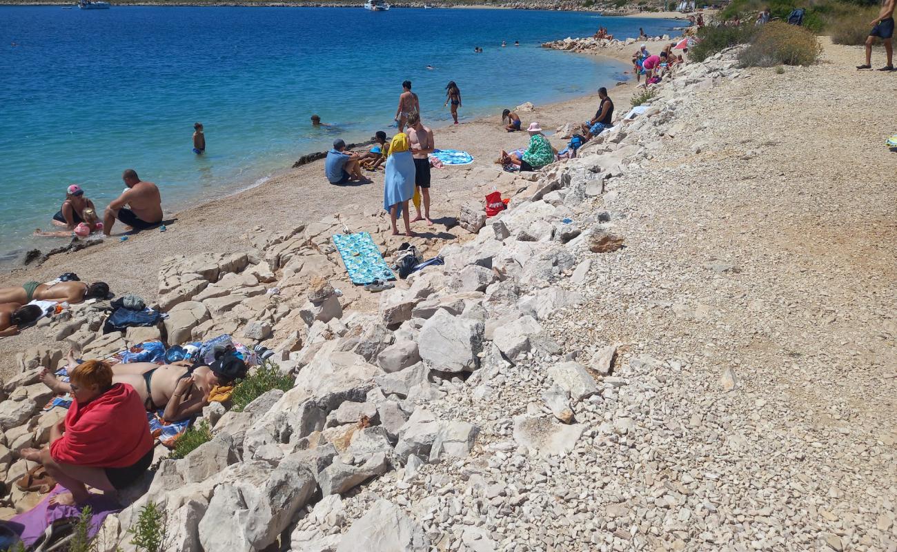 Lavdara Beach'in fotoğrafı parlak kum ve kayalar yüzey ile