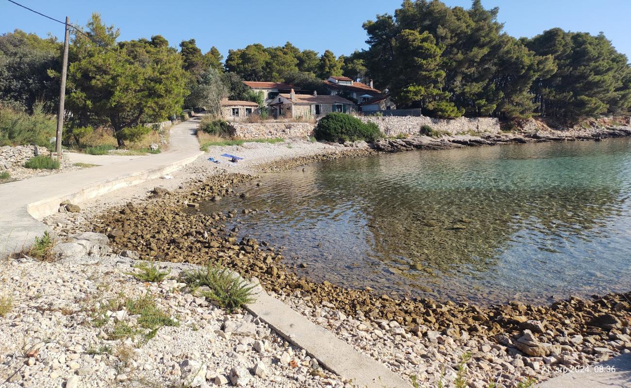 Dolinje Beach'in fotoğrafı taşlar yüzey ile