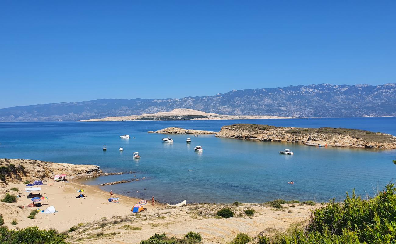 FKK Stolac Beach'in fotoğrafı açık bej kum yüzey ile
