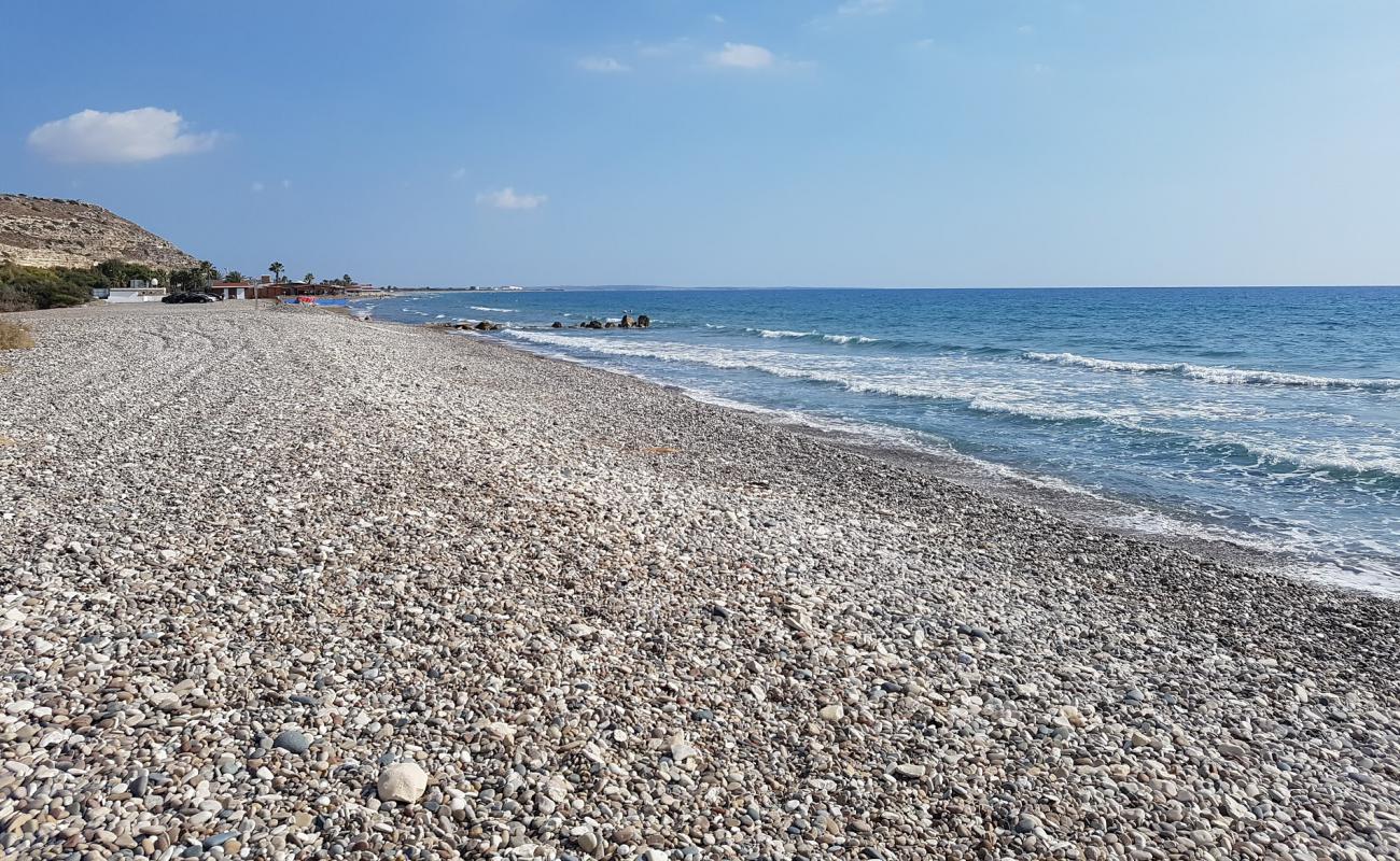 Kourion Beach'in fotoğrafı bej kum ve çakıl yüzey ile