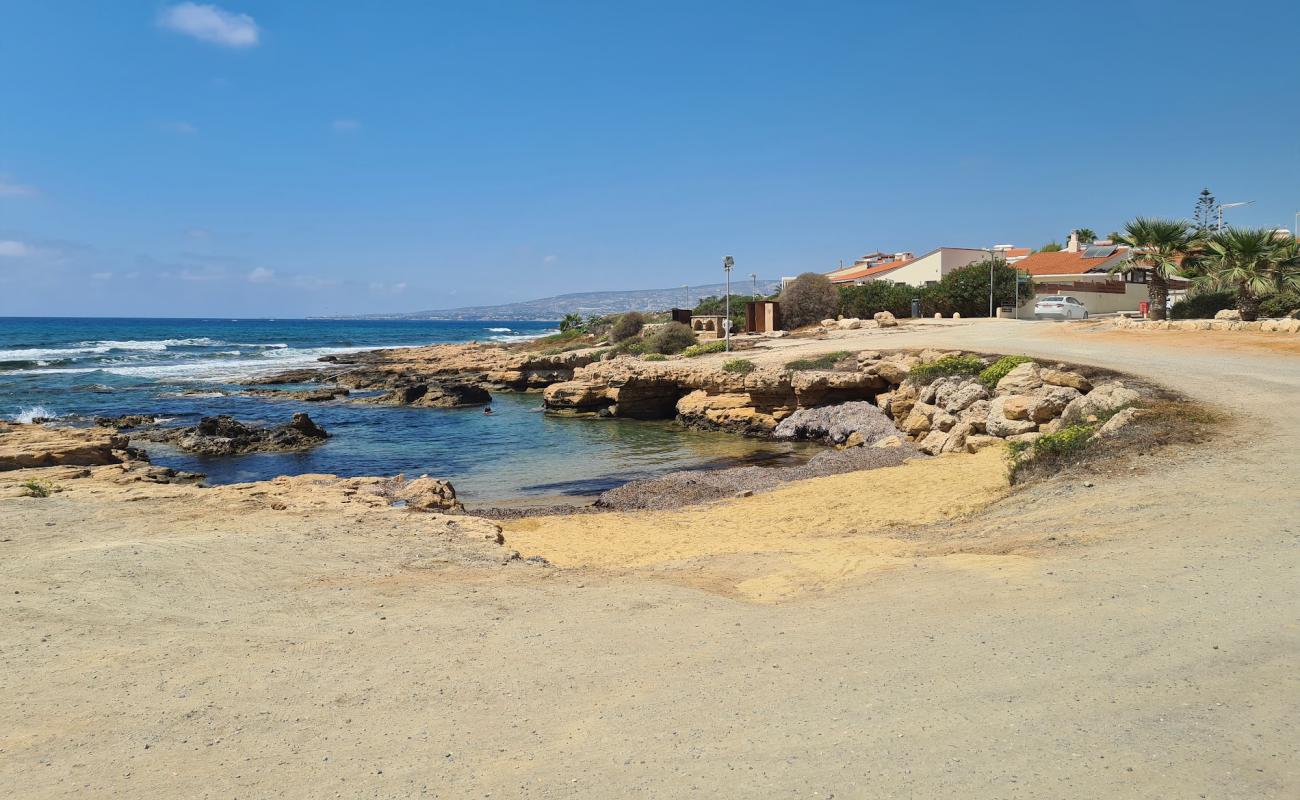 Dimma Beach'in fotoğrafı bej kum ve kayalar yüzey ile