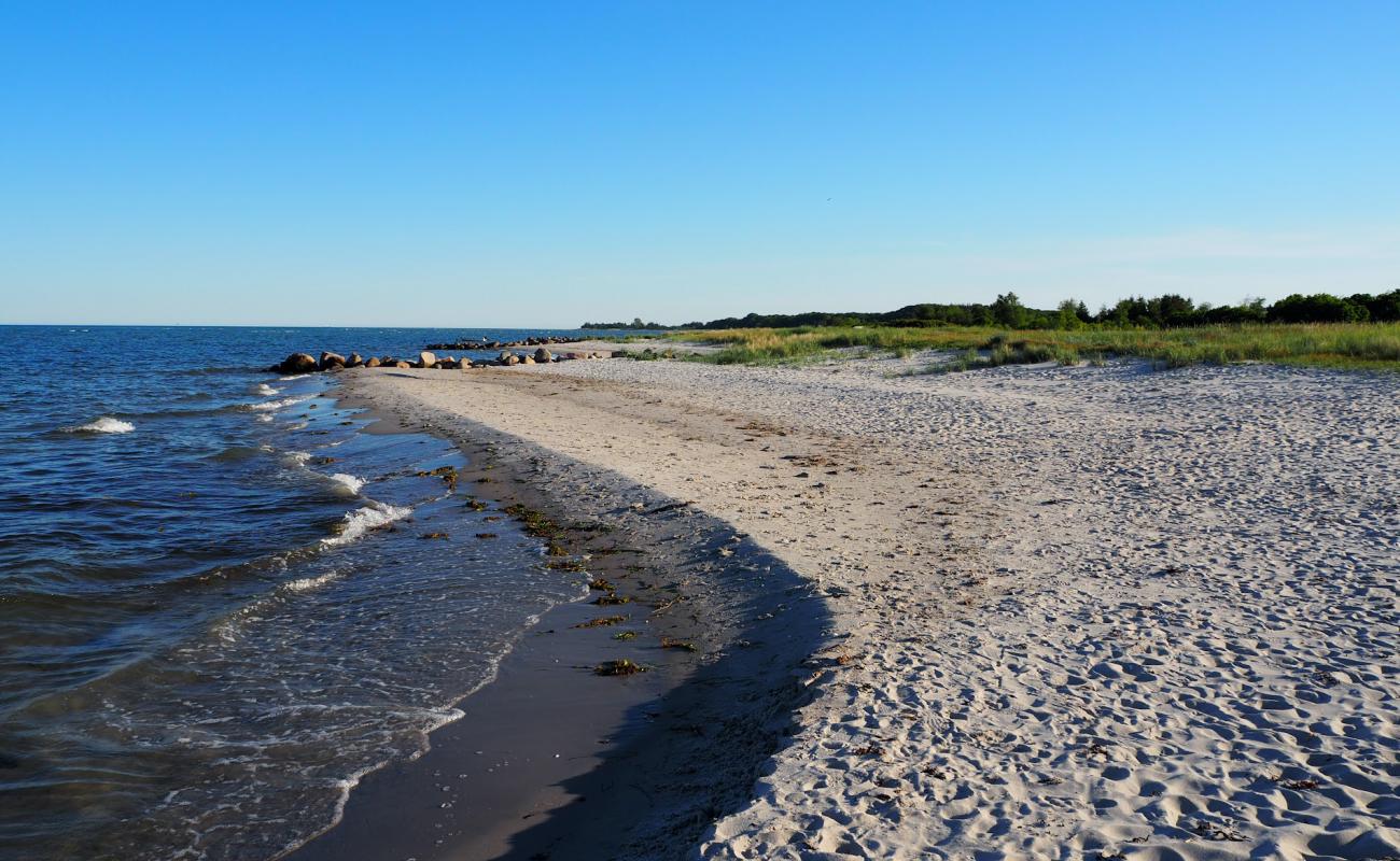 Drejet Beach'in fotoğrafı bej kum ve kayalar yüzey ile
