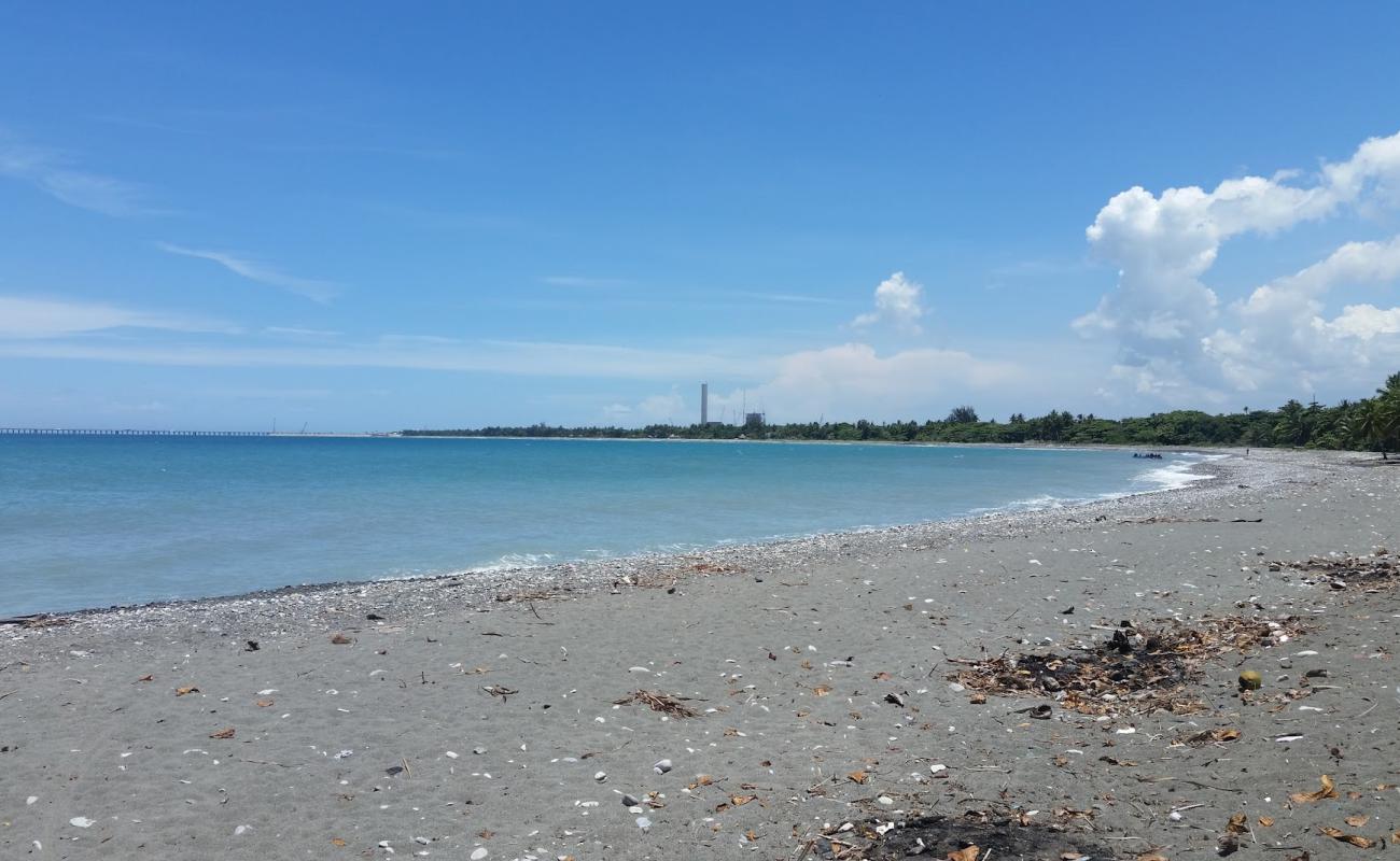 Nizao beach'in fotoğrafı gri kum yüzey ile