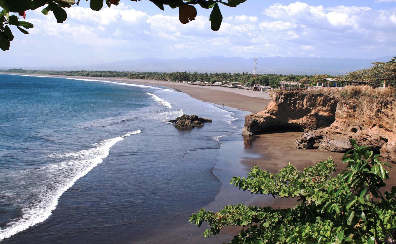 Acajutla Beach'in fotoğrafı kahverengi kum yüzey ile