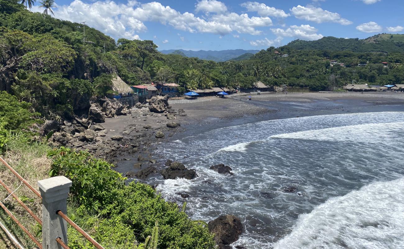 El Palmarcito Beach'in fotoğrafı gri kum ve çakıl yüzey ile