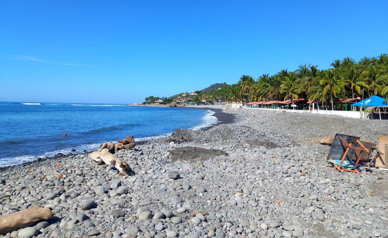 Playa El Tunco'in fotoğrafı gri kum ve çakıl yüzey ile