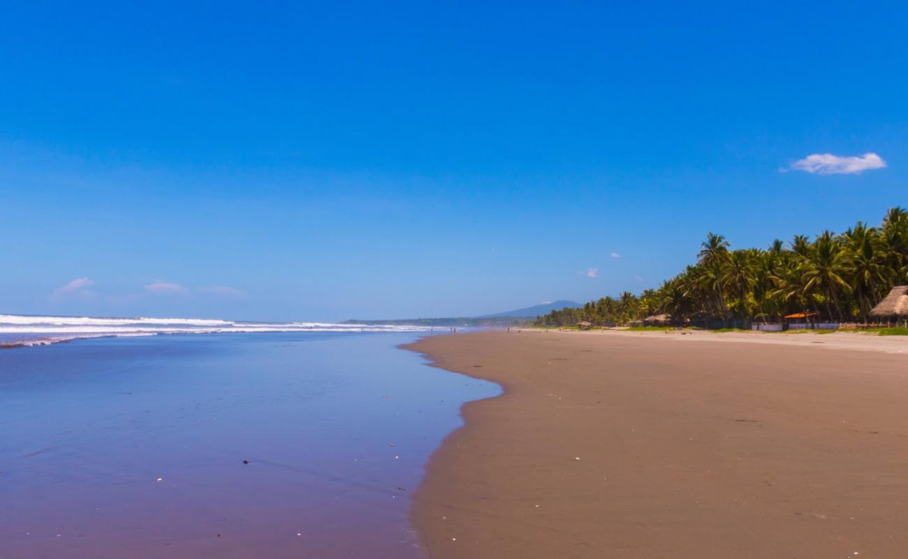 Los Caracoles beach'in fotoğrafı gri kum yüzey ile