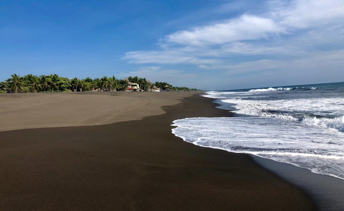 Playa de Monterrico'in fotoğrafı kahverengi kum yüzey ile