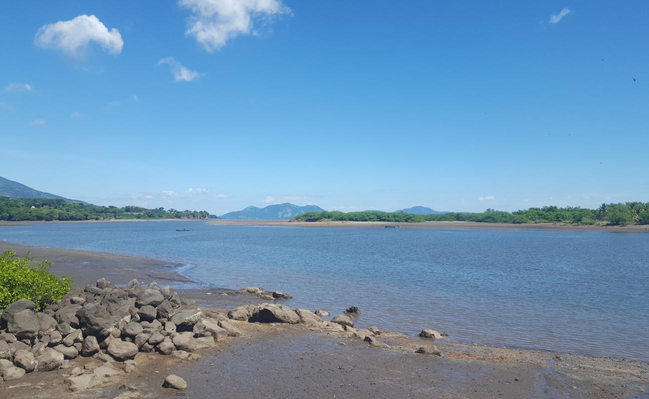 Playa El Tamarindo'in fotoğrafı parlak kum yüzey ile