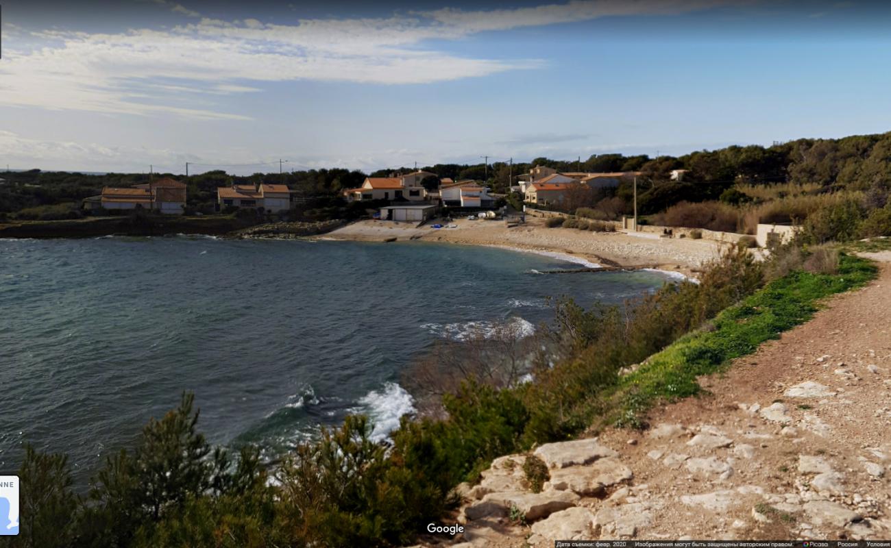 Couronne Vielle beach'in fotoğrafı turkuaz saf su yüzey ile