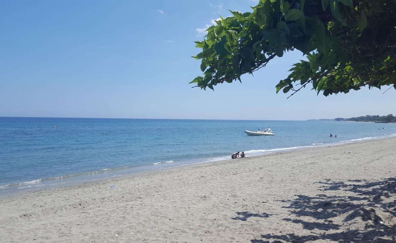 Moriani Plajı'in fotoğrafı parlak kum yüzey ile