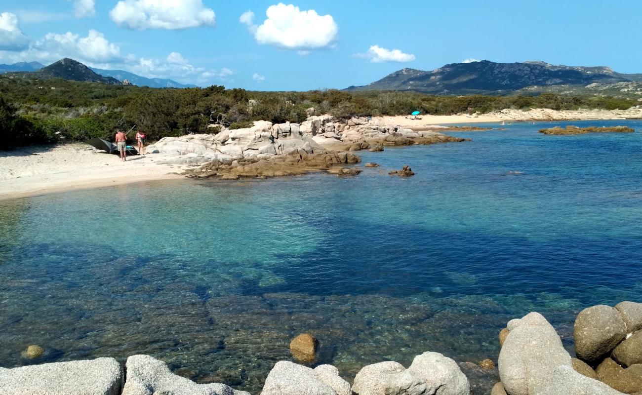 La Testa beach VI'in fotoğrafı açık bej kum yüzey ile