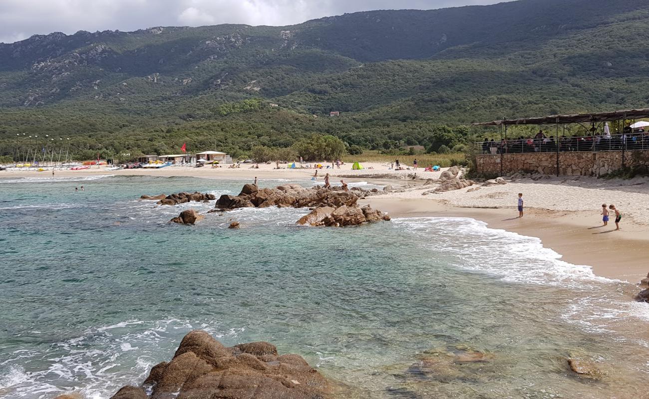 Portigliolo beach'in fotoğrafı parlak ince kum yüzey ile