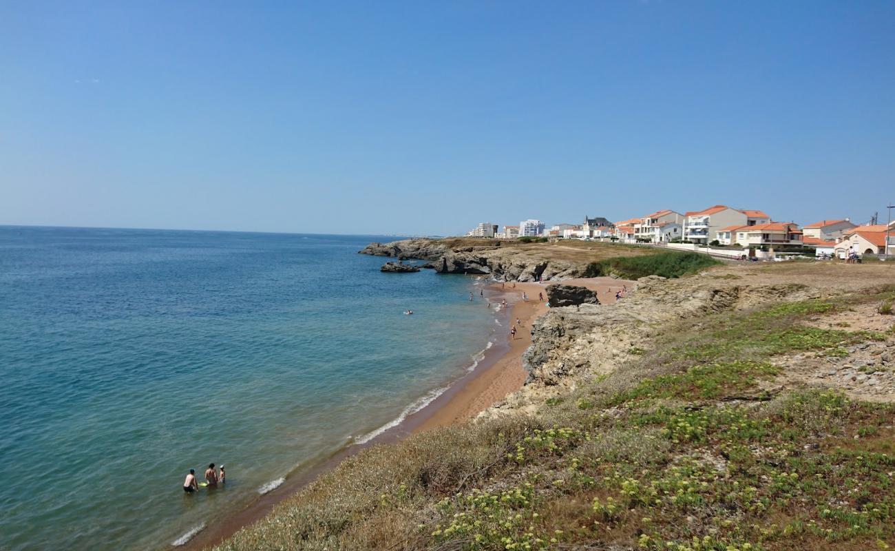 Bussoleries beach'in fotoğrafı bej kum ve kayalar yüzey ile