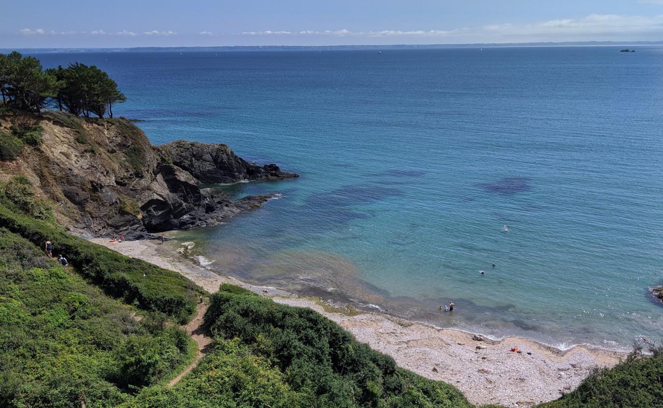 Plage de la Source'in fotoğrafı bej kum ve çakıl yüzey ile