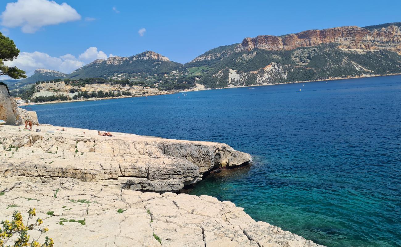 Plage naturiste Reco Max'in fotoğrafı kayalık arazi yüzey ile