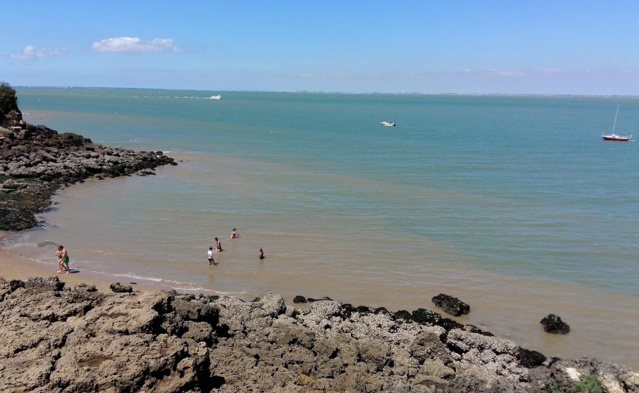 Plage Baby'in fotoğrafı bej kum ve kayalar yüzey ile