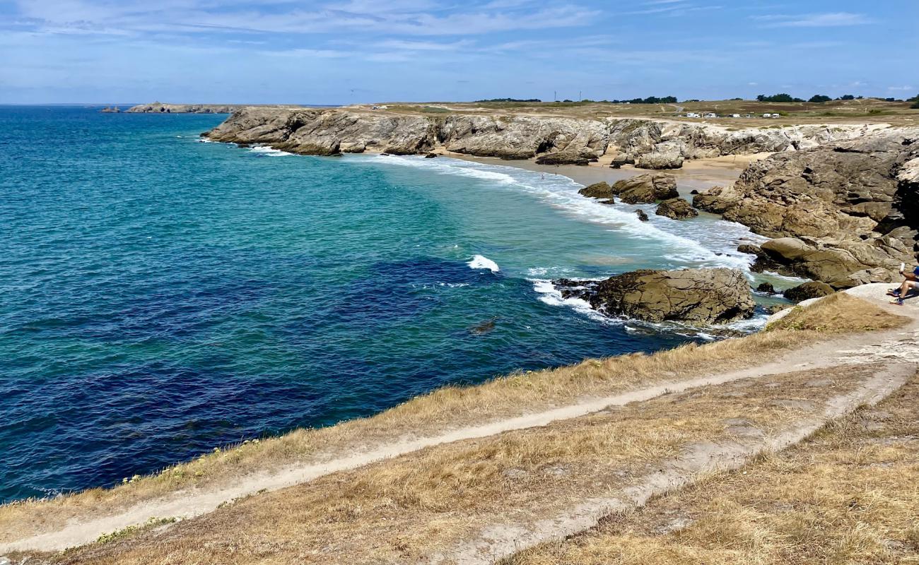 Plage de Port Goulom'in fotoğrafı parlak kum yüzey ile