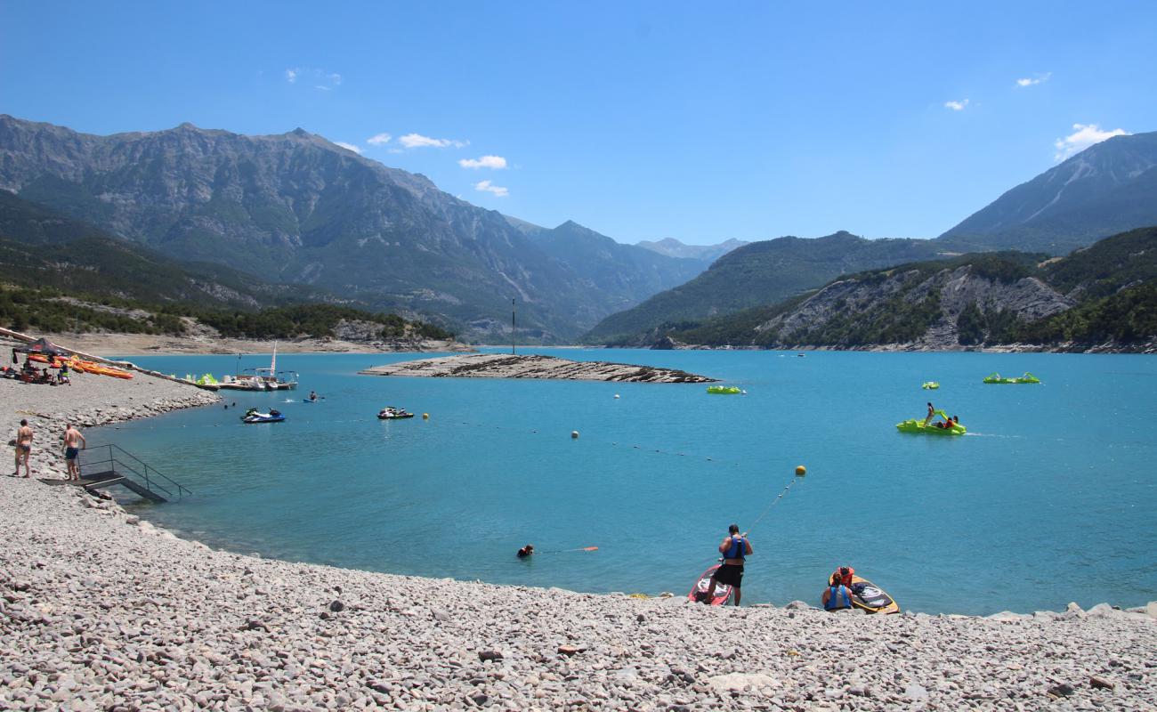 Plage de Port Saint Pierre'in fotoğrafı taşlı kum yüzey ile
