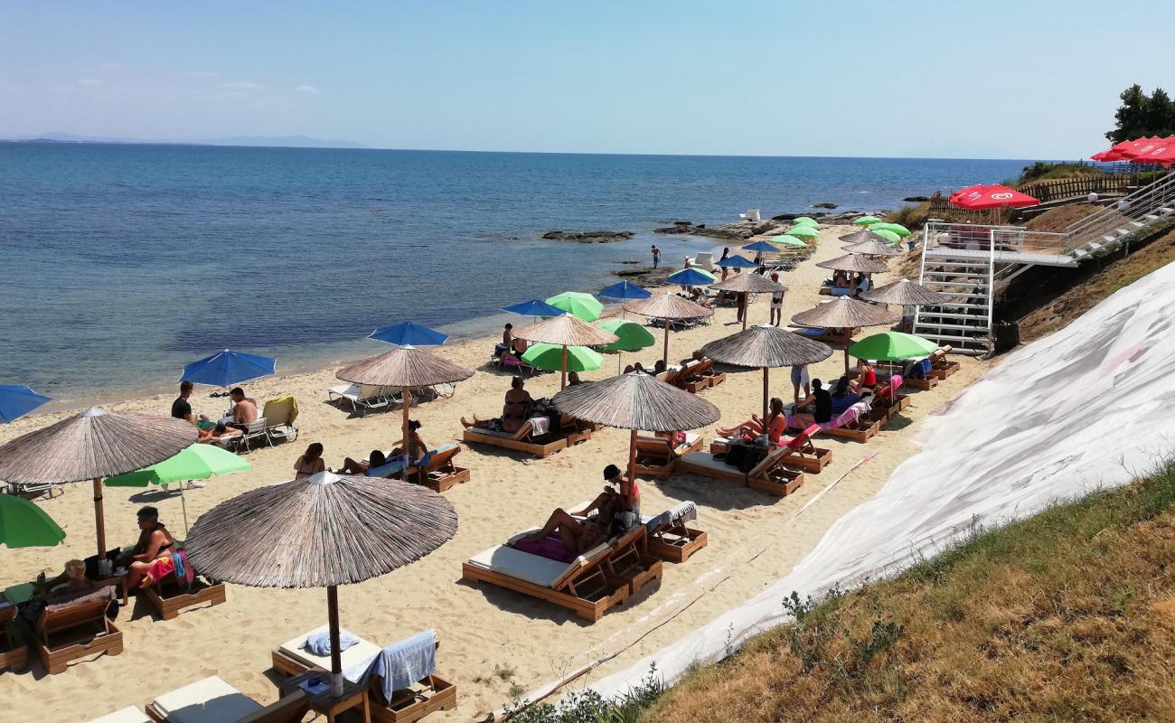 Paralia Porto Molo'in fotoğrafı parlak kum yüzey ile