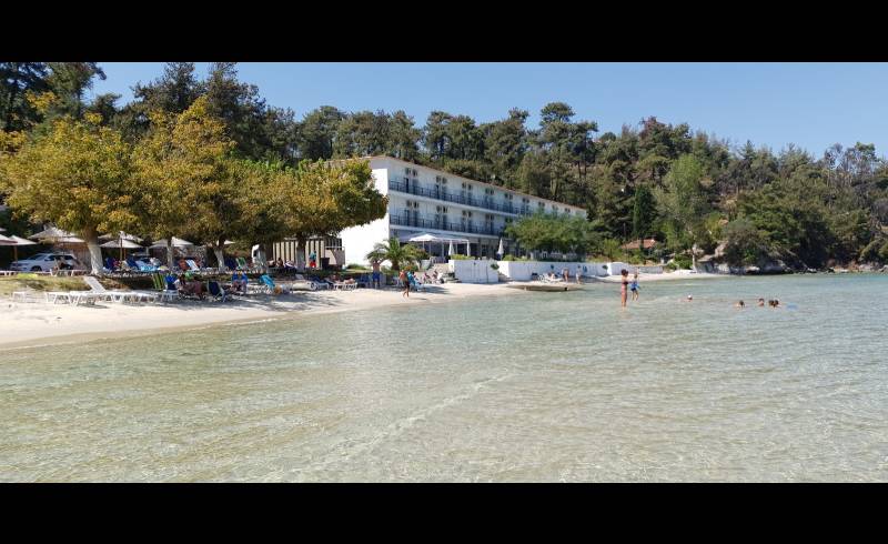 Paralia Glifadas'in fotoğrafı beyaz kum yüzey ile
