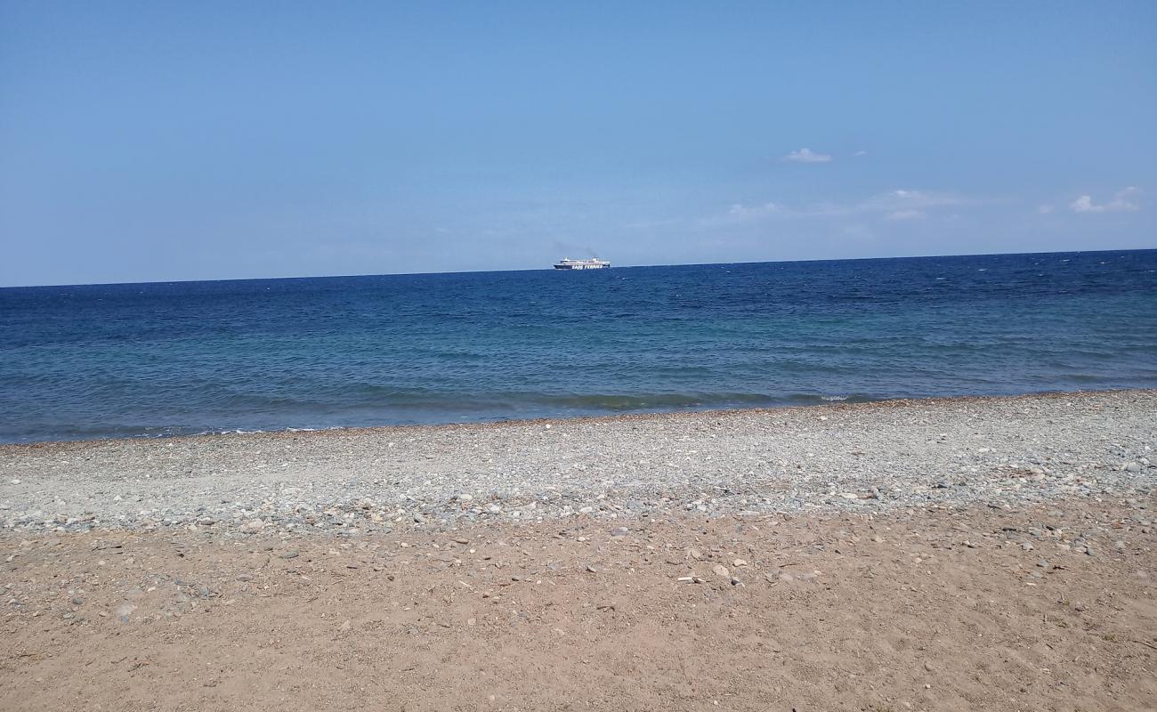 Limnidi beach'in fotoğrafı bej kum ve çakıl yüzey ile