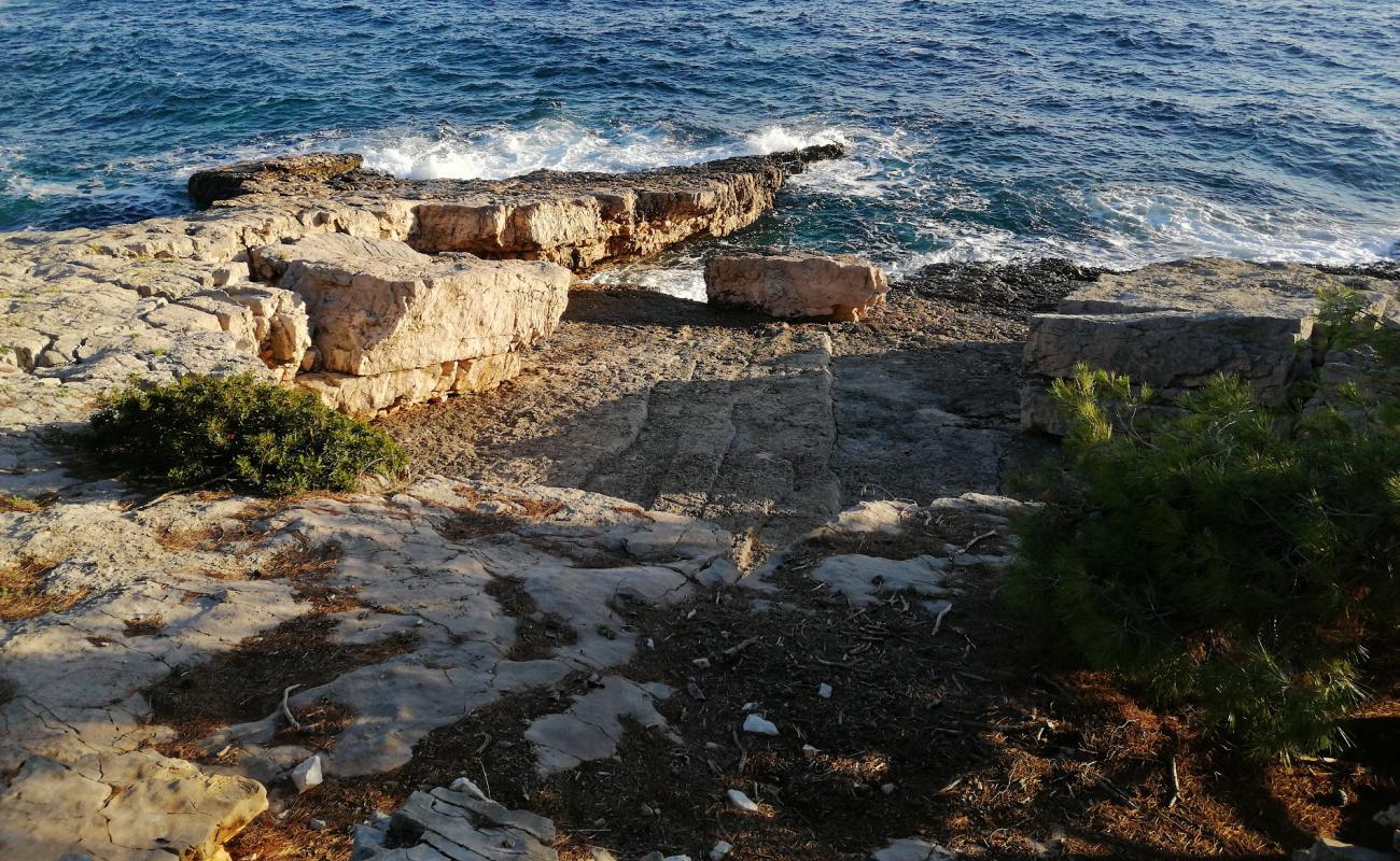 Inviaggioconale beach'in fotoğrafı taşlar yüzey ile