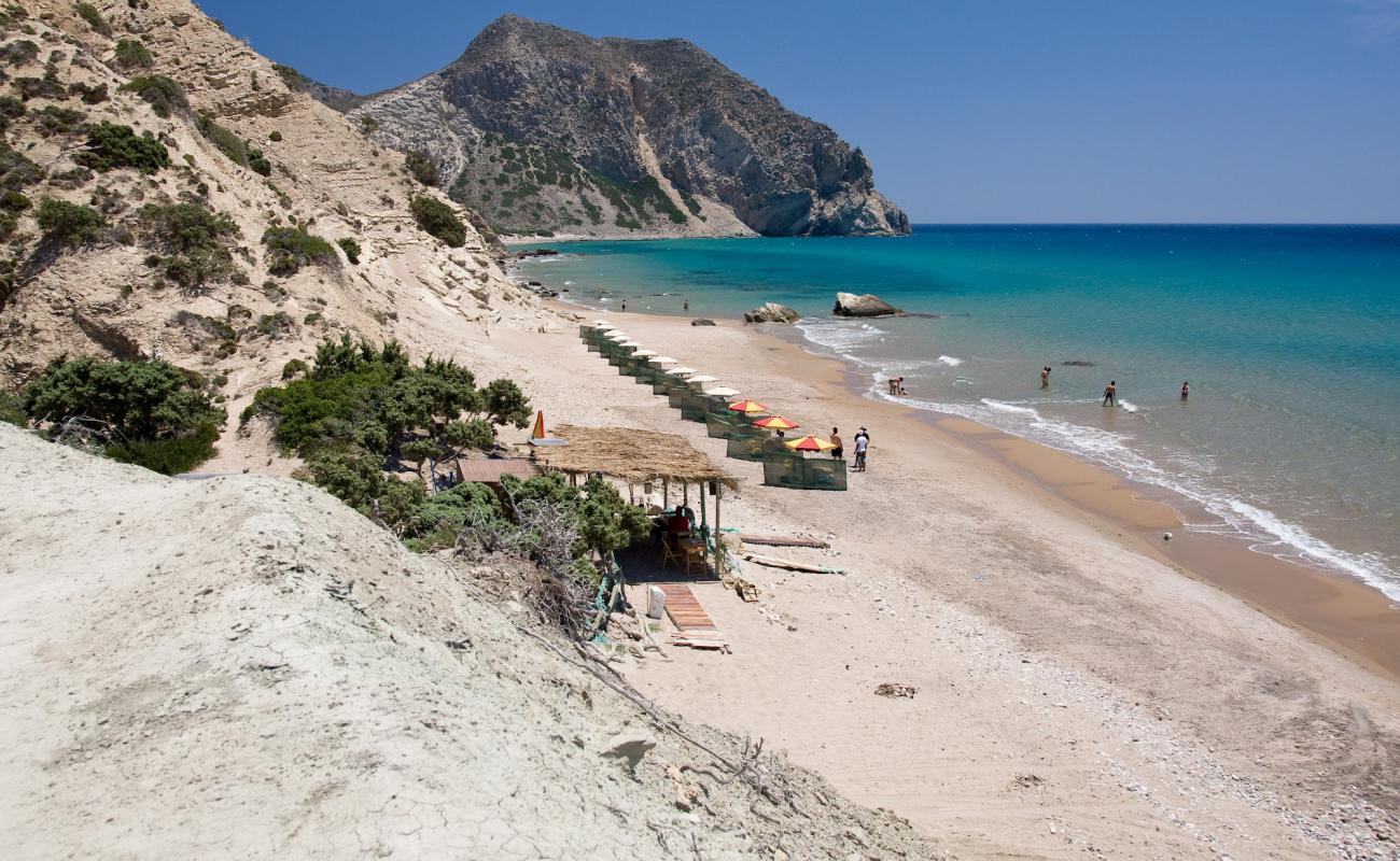 Paradise beach'in fotoğrafı açık bej kum yüzey ile